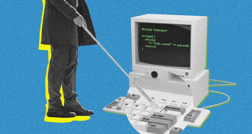 Τυφλός άνθρωπος πατάει σε πληκτρολόγιο υπολογιστή το enter με λευκό μπαστούνι