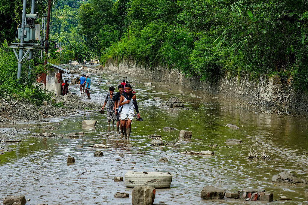 Flooding in the Bhotekoshi River affects riverbanks and houses in Nuwakot, Nepal, on August 26, 2026. The flooding caused widespread damage to homes, roads, bridges and other infrastructure in the area, while many people remain missing; the figures are still developing. (Photo by Ambir Tolang/NurPhoto via Getty Images)