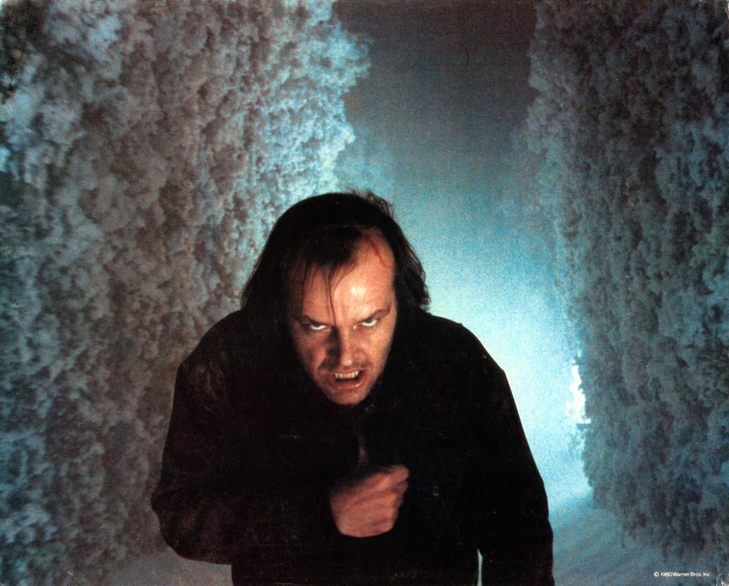 Jack Nicholson walking through snowy maze in lobby card for the film 'The Shining', 1980.