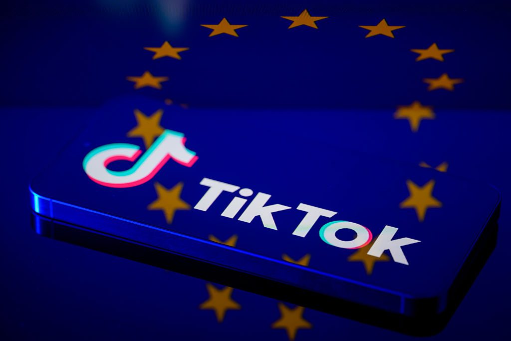 The TikTok logo is displayed on a smartphone screen in this photo illustration in Brussels, Belgium, on March 30, 2026. The platform faces regulatory scrutiny in Europe regarding concerns about design features and potential impacts on children's mental health under the EU's Digital Services Act.